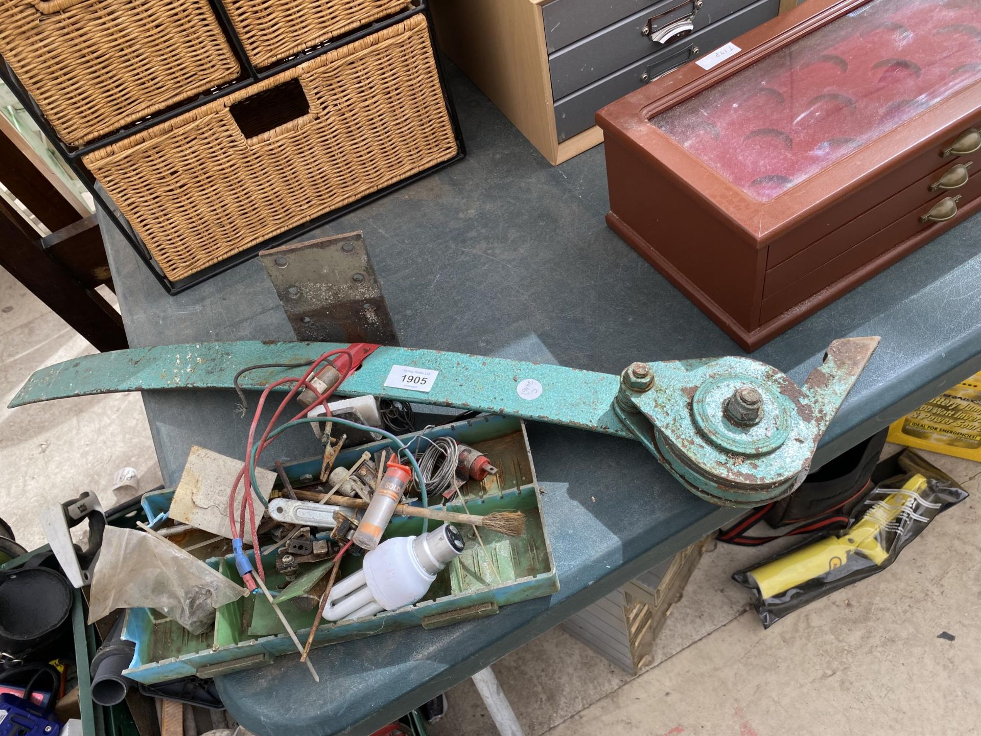 AN ASSORTMENT OF CAR SPARES AND A METAL ARM