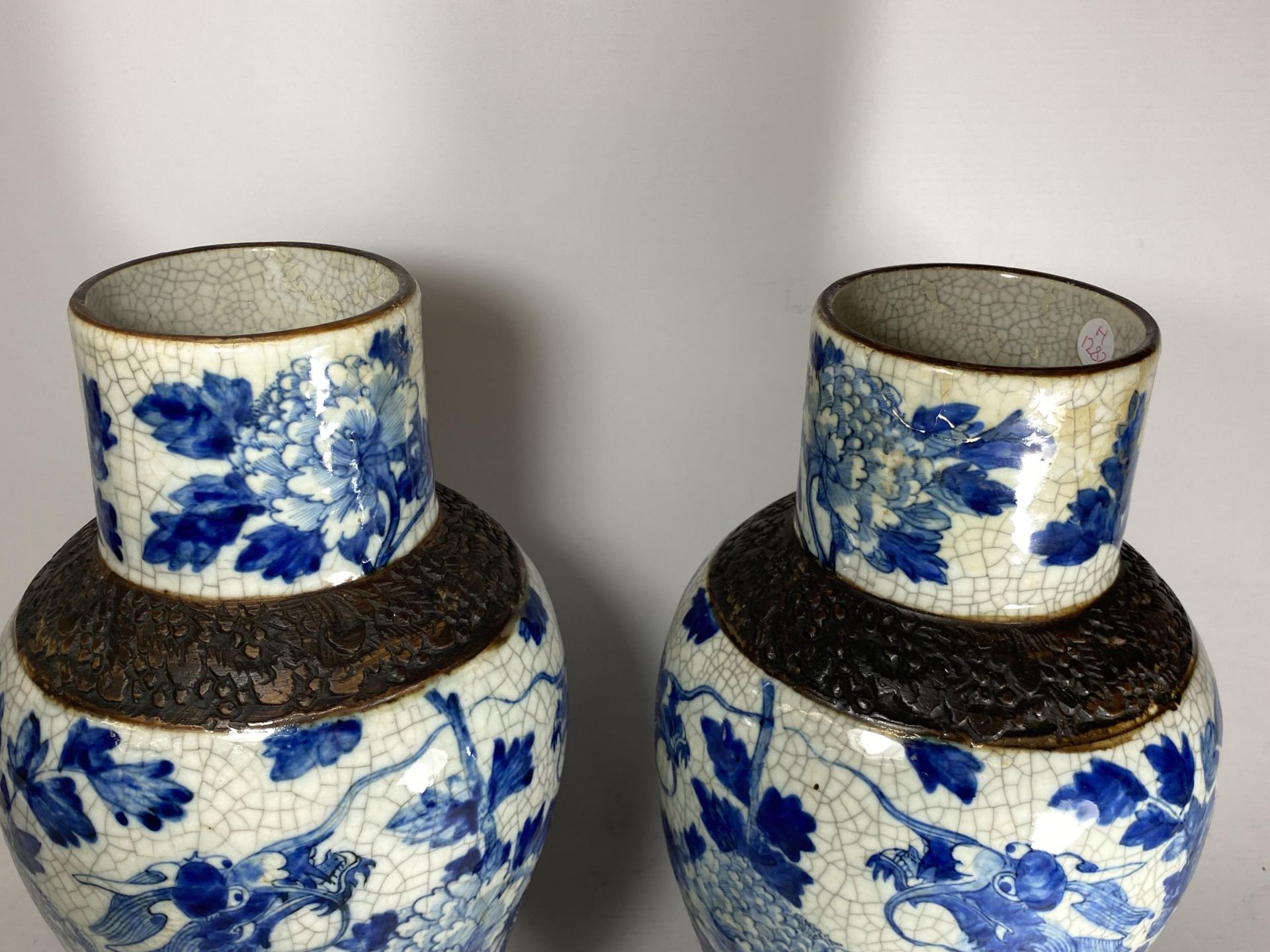 A PAIR OF EARLY 20TH CENTURY CHINESE BLUE AND WHITE CRACKLE GLAZE DRAGON DESIGN VASES, A/F, HEIGHT - Image 4 of 13