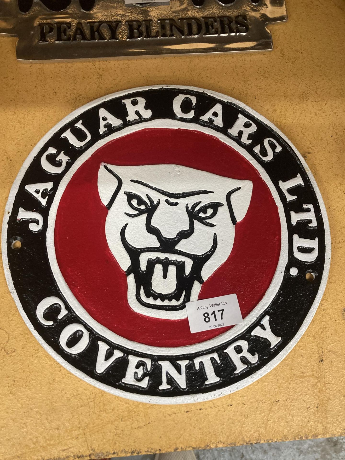 A CAST SIGN 'JAGUAR CARS LTD', COVENTRY DIAMETER 24CM