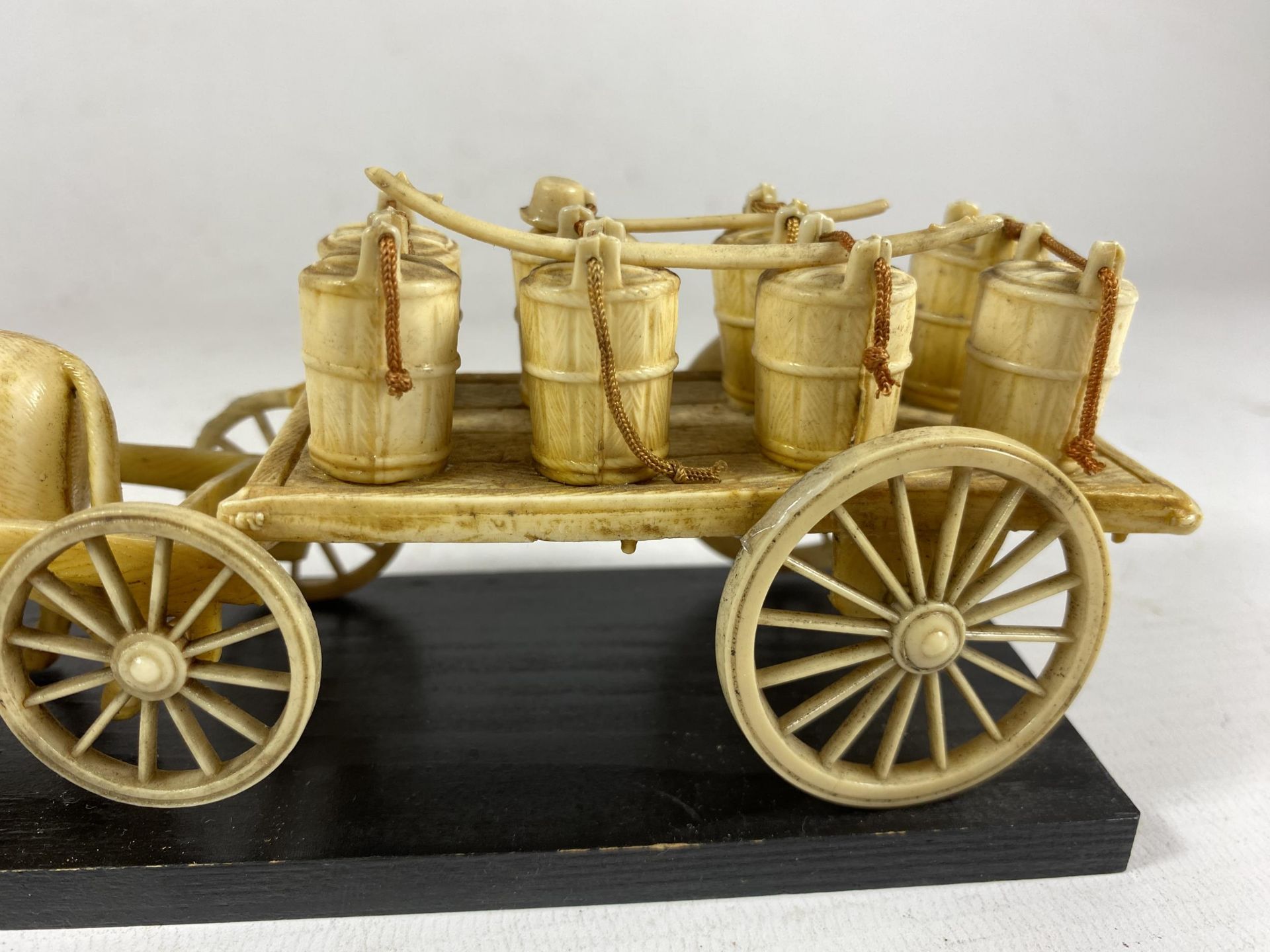 AN ORIENTAL BONE EFFECT MODEL OF A CHINESE MAN WITH HORSE AND CART - Image 3 of 4