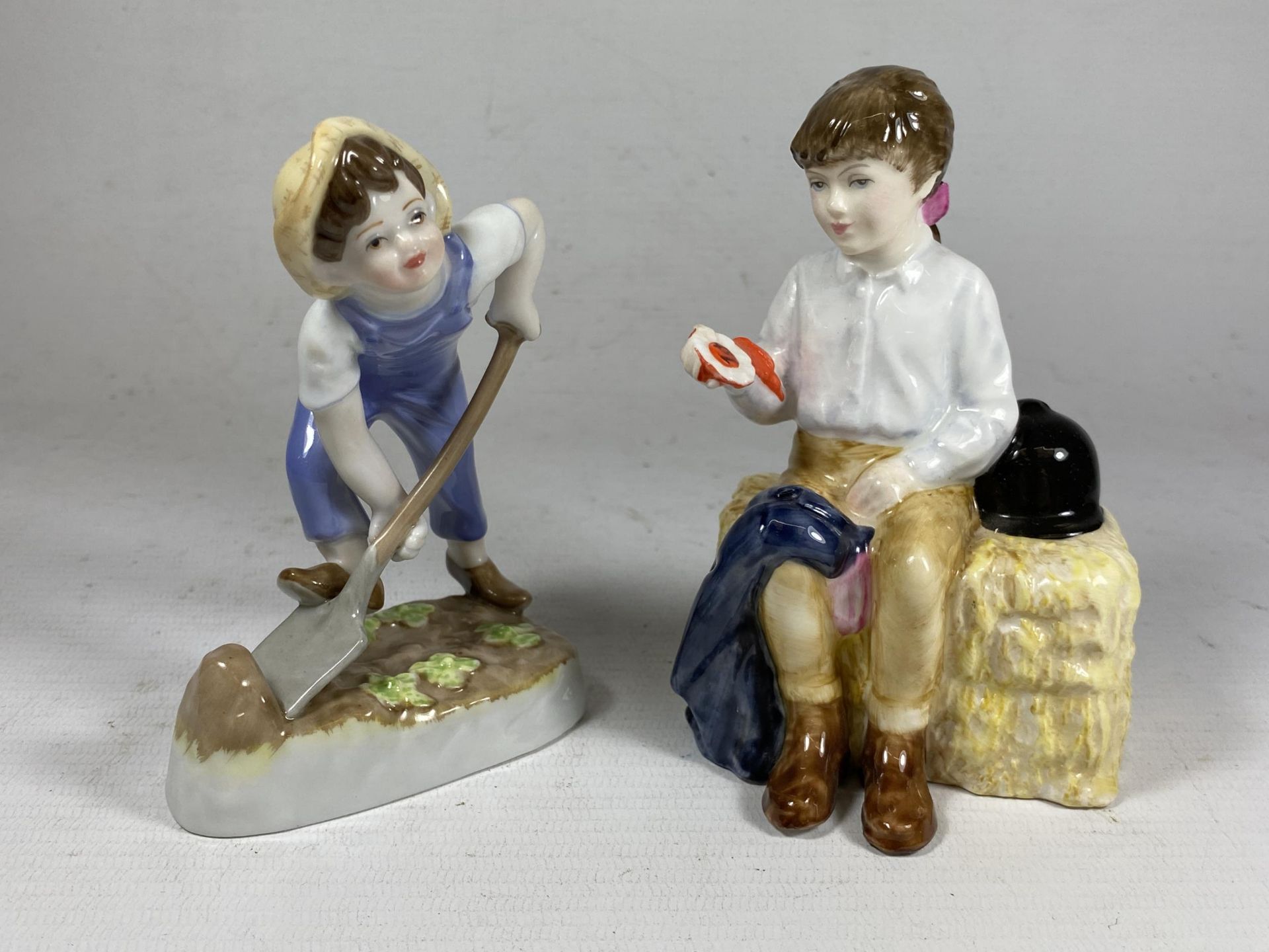 TWO FIGURES - ROYAL WORCESTER 'SATURDAY BOY' & ROYAL DOULTON 'FIRST PRIZE' HN3911