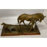 A VINTAGE METAL FIGURE GROUP OF A HUNTER, HORSE AND TWO DOGS - 'LA POURSUITE', HEIGHT 23CM