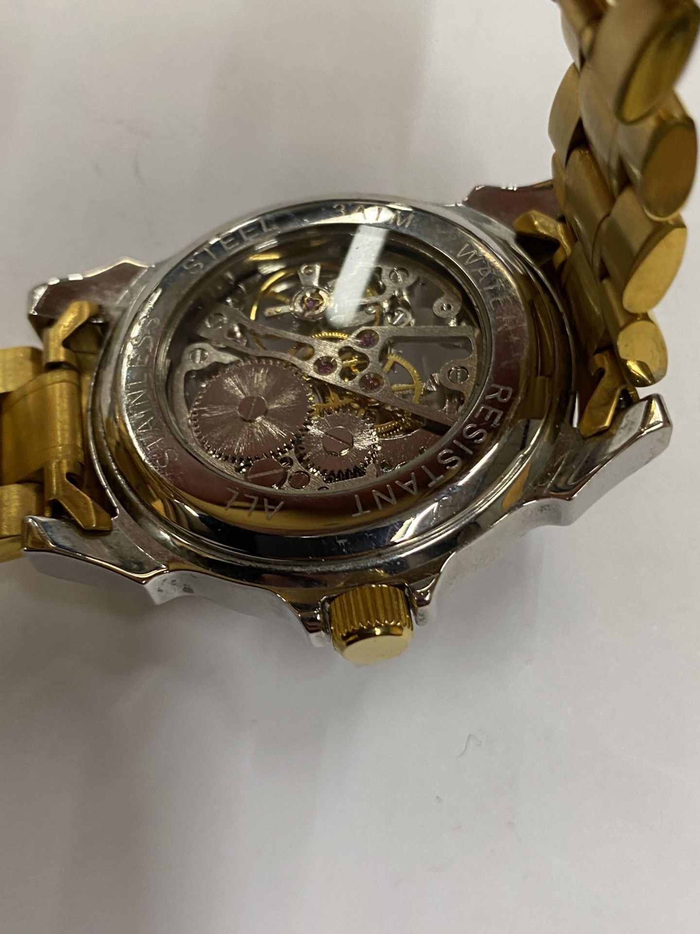 A GENTS SKELETON WATCH, WORKING WHEN CATALOGUED BUT NO WARRANTIES GIVEN - Image 3 of 3