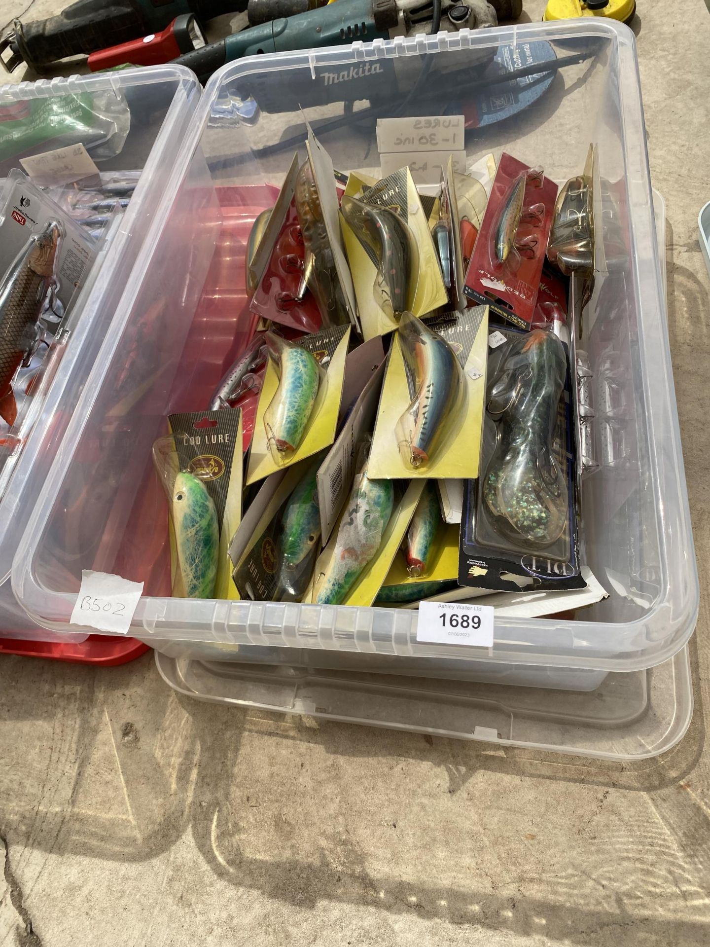 A BOX CONTAINING A LARGE NUMBER OF AS NEW LURES (FROM A TACKLE SHOP CLEARANCE)