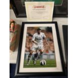 A FRAMED SIGNED PHOTOGRAPH OF GARETH BALE WITH 'LEGENDS' CERTIFICATE OF AUTHENTICITY, DATED APRIL