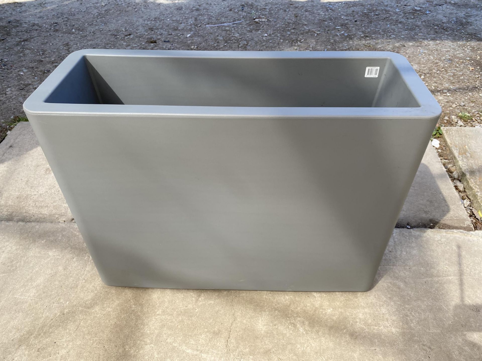 AN AS NEW GREY PLASTIC ELHO EASY MOVE RECTANGULAR TROUGH PLANTER (78CM x 59CM x 29CM)