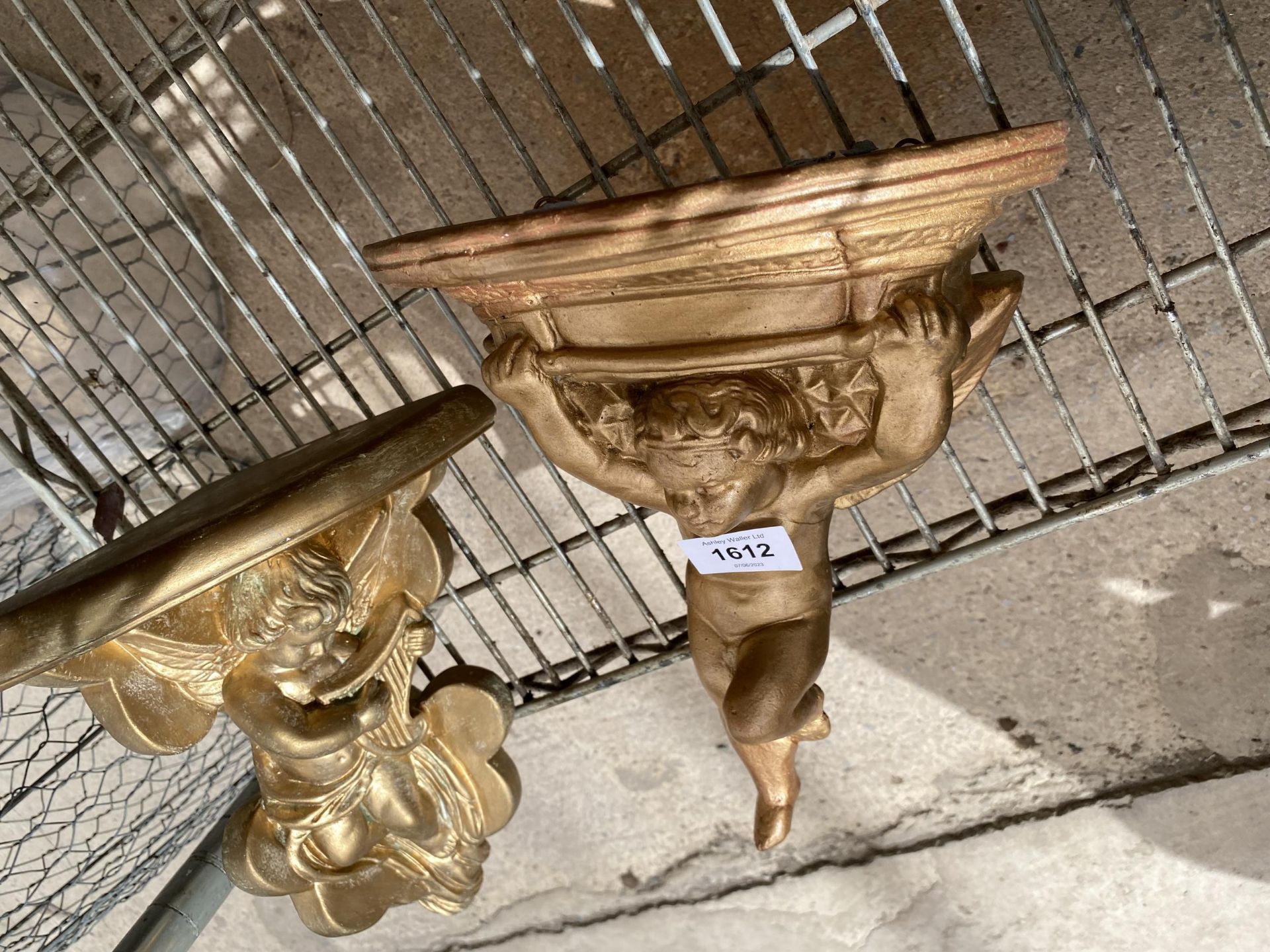 A PAIR OF GILT CHERUB WALL SCONCES - Image 2 of 2