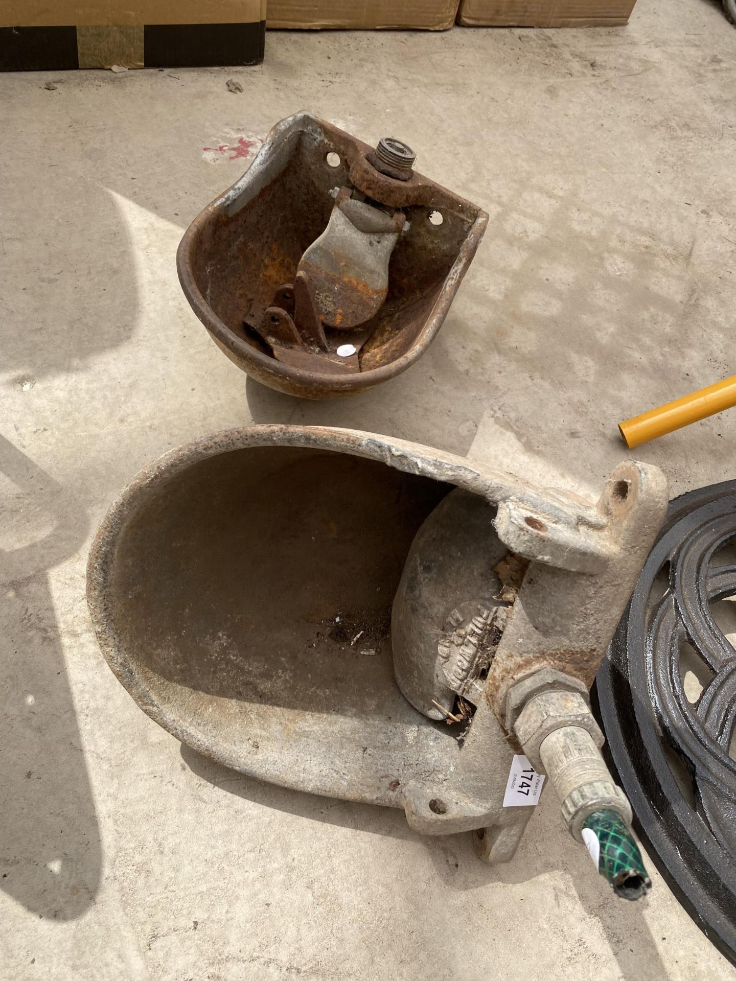 TWO VINTAGE GALVANISED WATER BOWLS