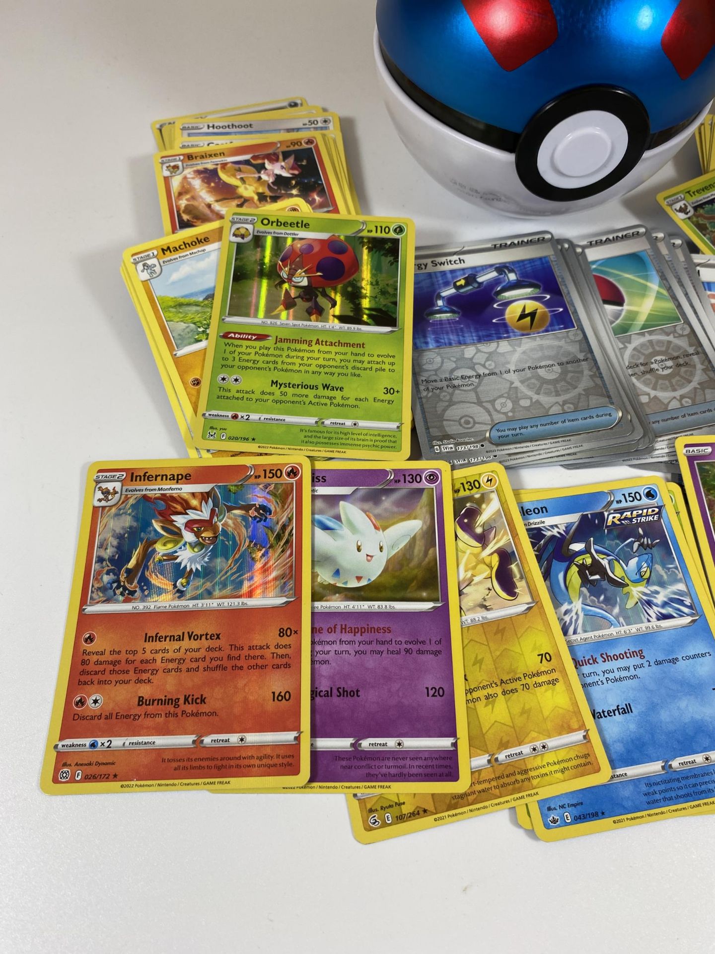 A POKEMON POKE BALL TIN OF ASSORTED CARDS, RARES, HOLOS, RARE HOLO TRAINERS ETC - Image 2 of 3