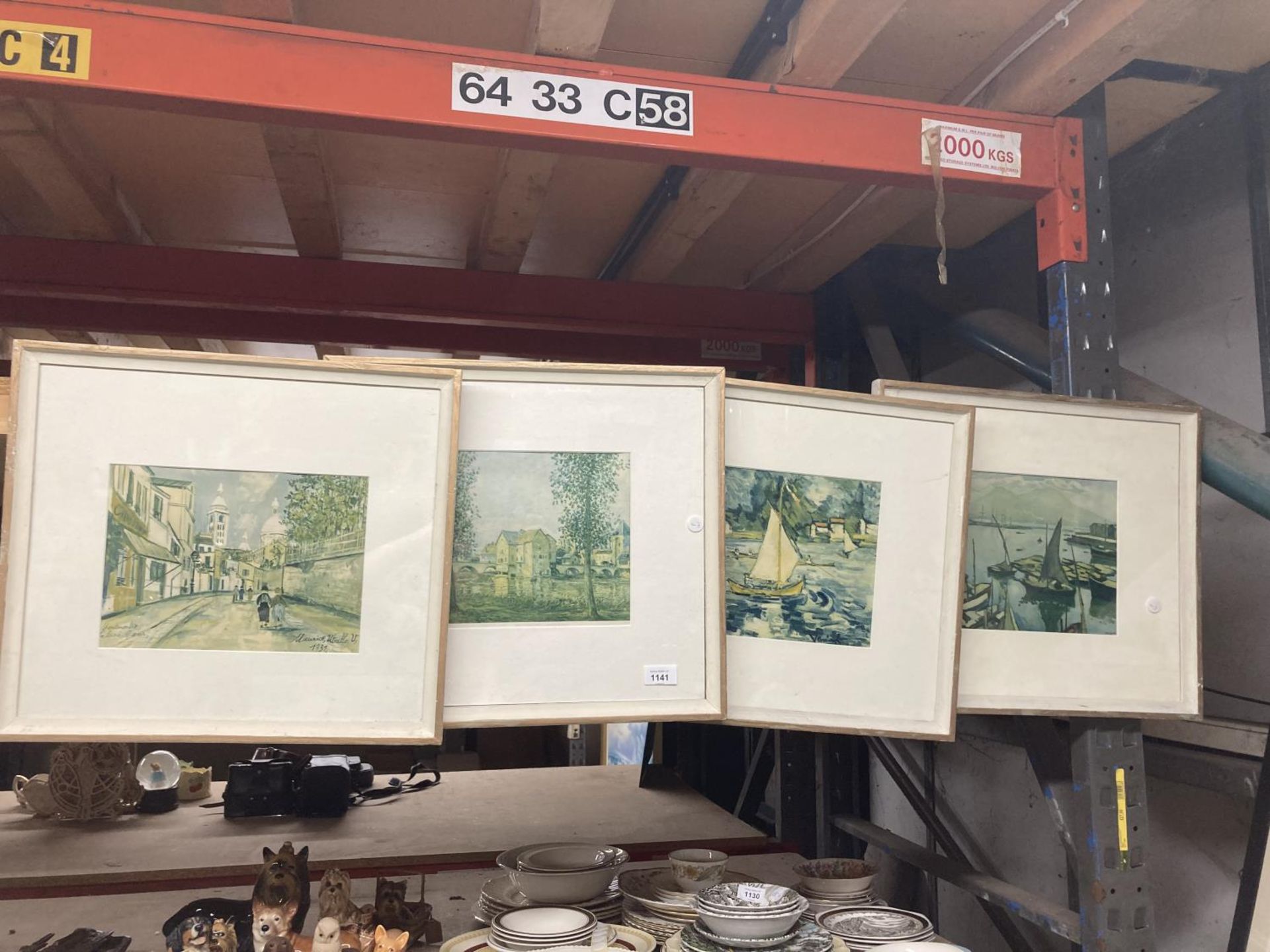 A SET OF FOUR VINTAGE FRAMED PRINTS