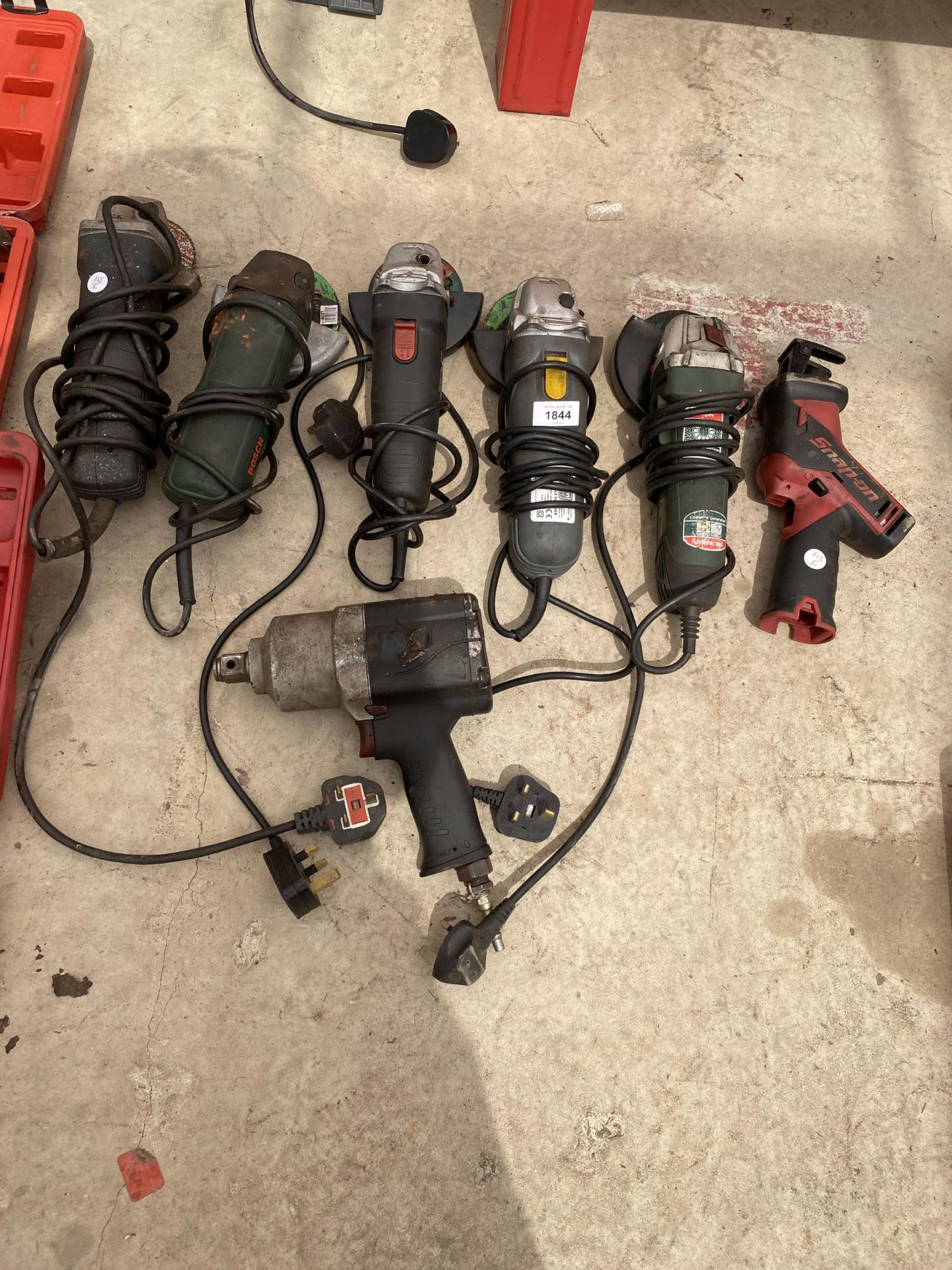 AN ASSORTMENT OF POWER TOOLS TO INCLUDE A COMPRESSOR IMPACT WRENCH AND FIVE GRINDERS ETC