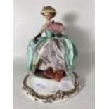 A VINTAGE CAPODIMONTE FIGURE OF A LADY AT REST