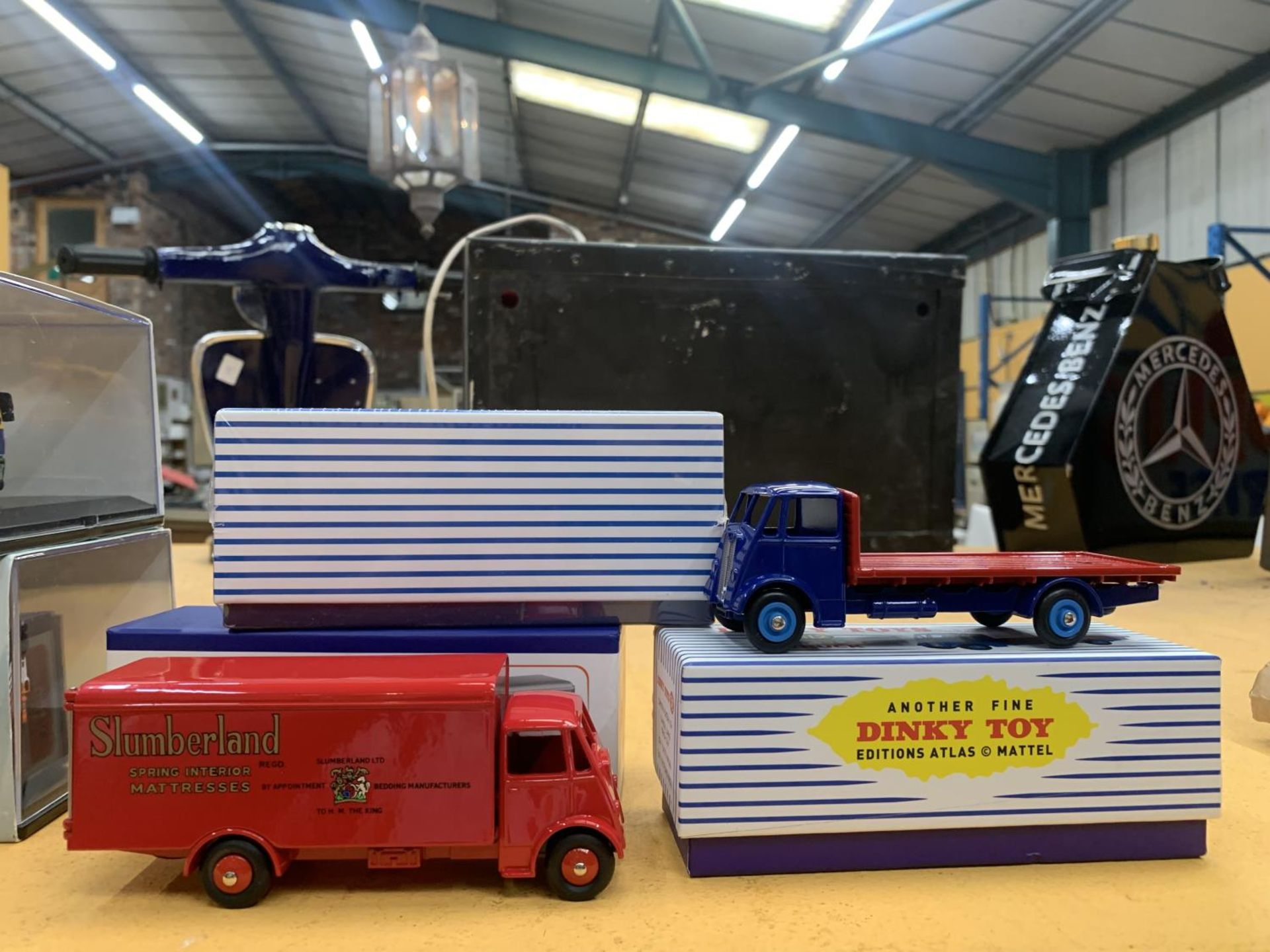 THREE ATLAS BOXED MODELS, DINKY 512 GUY PLATFORM LORRY, GUY VAN HEINZ AND GUY VAN SLUMBERLAND