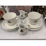 TWO GDA LIMOGES TRIOS PLUS TWO CREAM JUGS ALL WITH CREST DECORATION