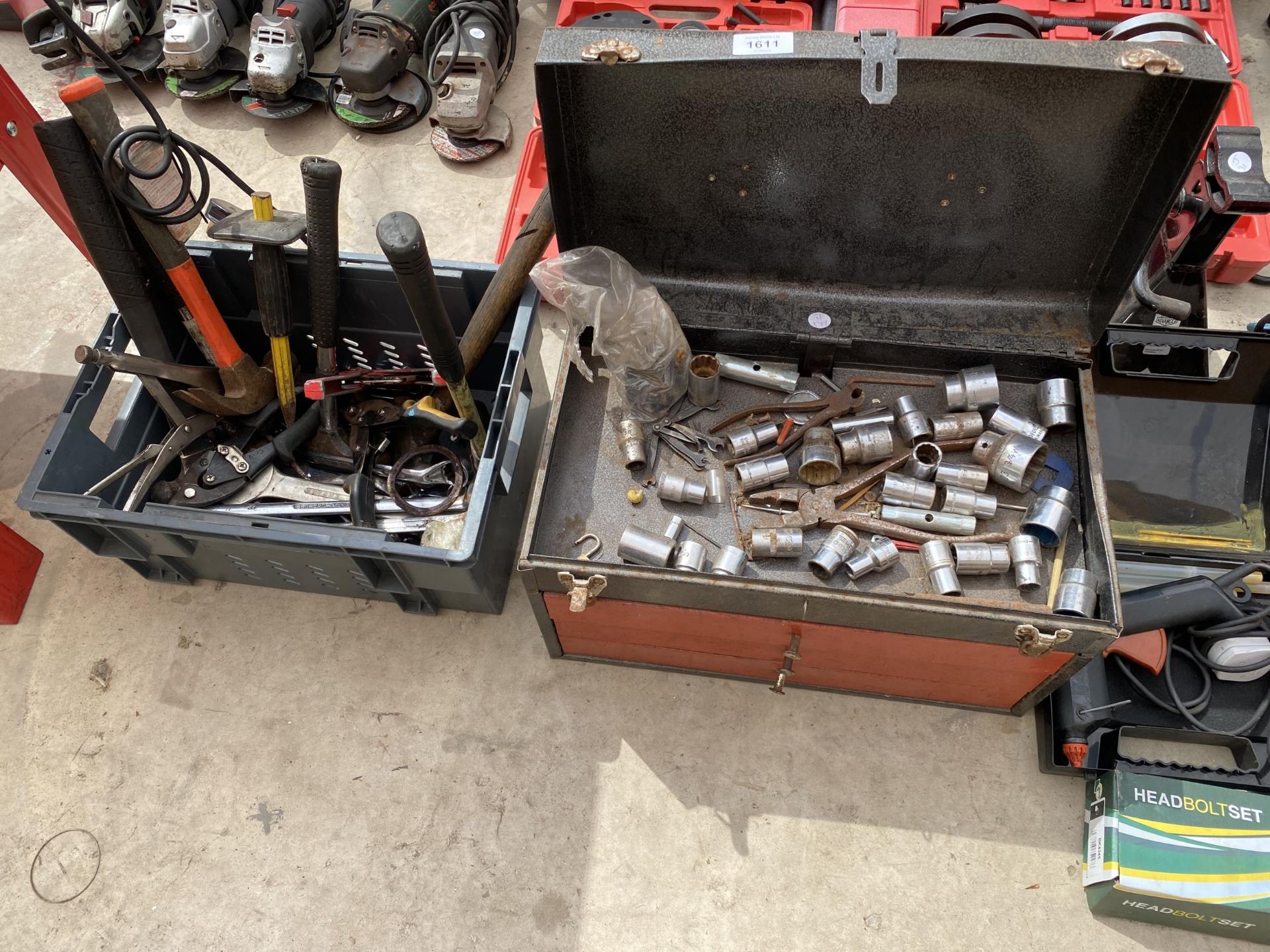 A METAL TOOL CHEST CONTAINING AN ASSORTMENT OF SOCKETS AND SPANNERS AND A FURTHER ASSORTMENT OF