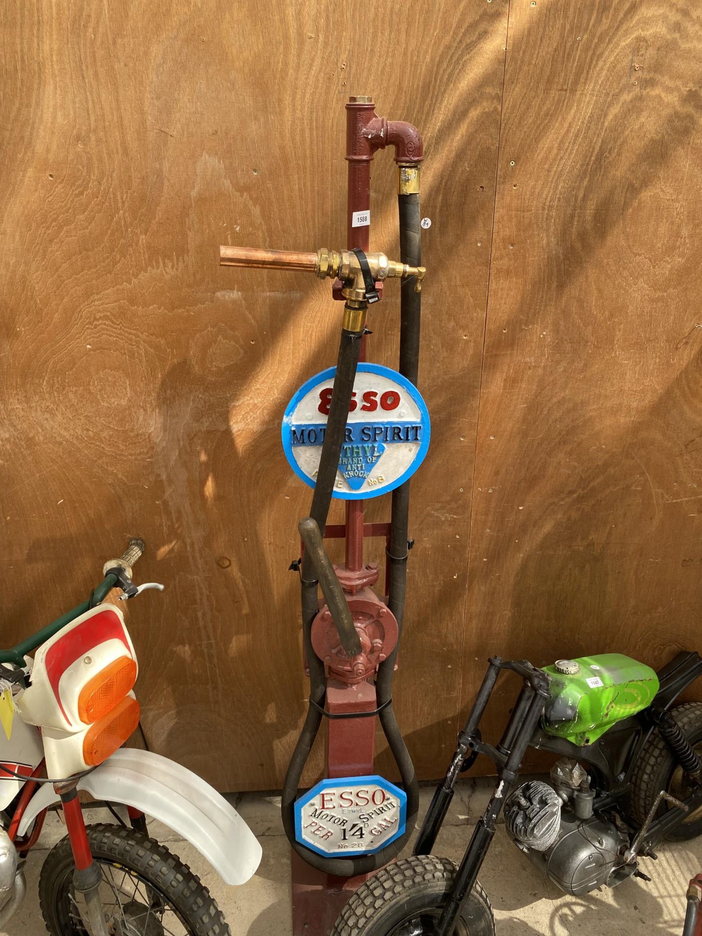 AN 'ESSO' PETROL PUMP WITH BRASS NOZZLE NO VAT