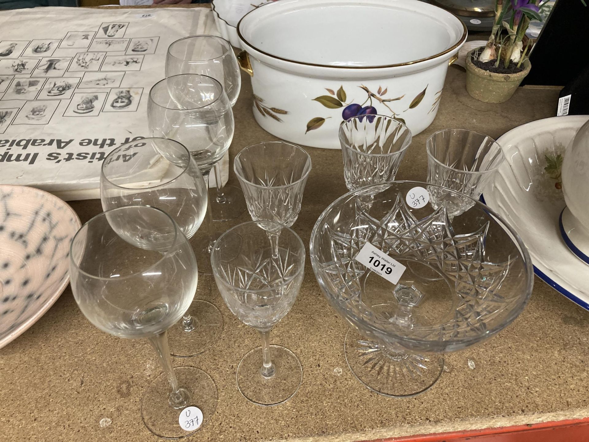 A QUANTITY OF WINE GLASSES PLUS A FOOTED BOWL