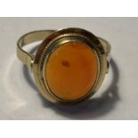 A 14 CARAT GOLD RING WITH AMBER STONE SIZE N GROSS WEIGHT 2.71 GRAMS