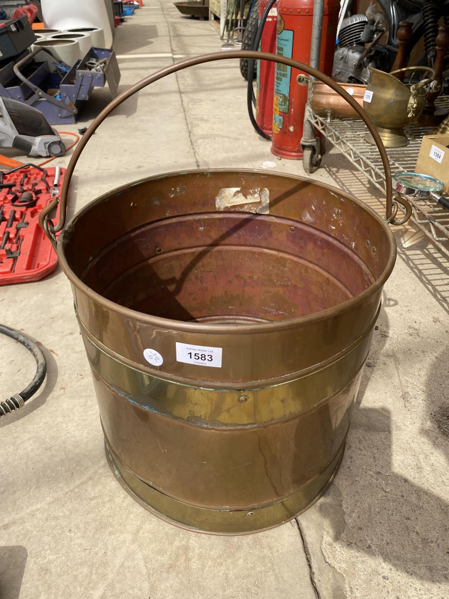 A VINTAGE COPPER AND BRASS COAL BUCKET