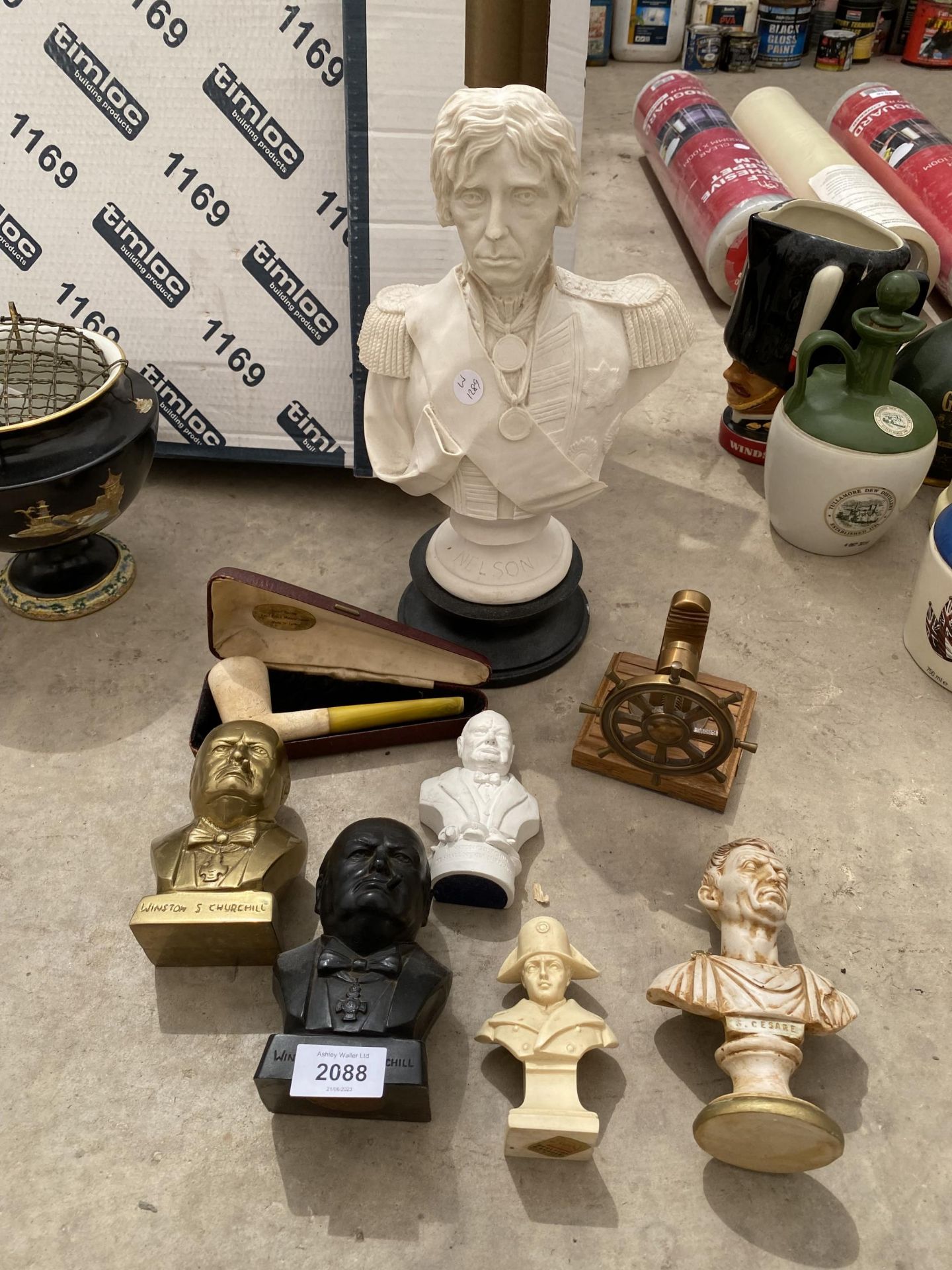 AN ASSORTMENT OF ITEMS TO INCLUDE A PIPE AND BUSTS OF NELSON AND CHURCHILL ETC