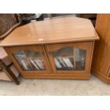 A WOODBERRY BROS & HAINES LTD TV CORNER UNIT