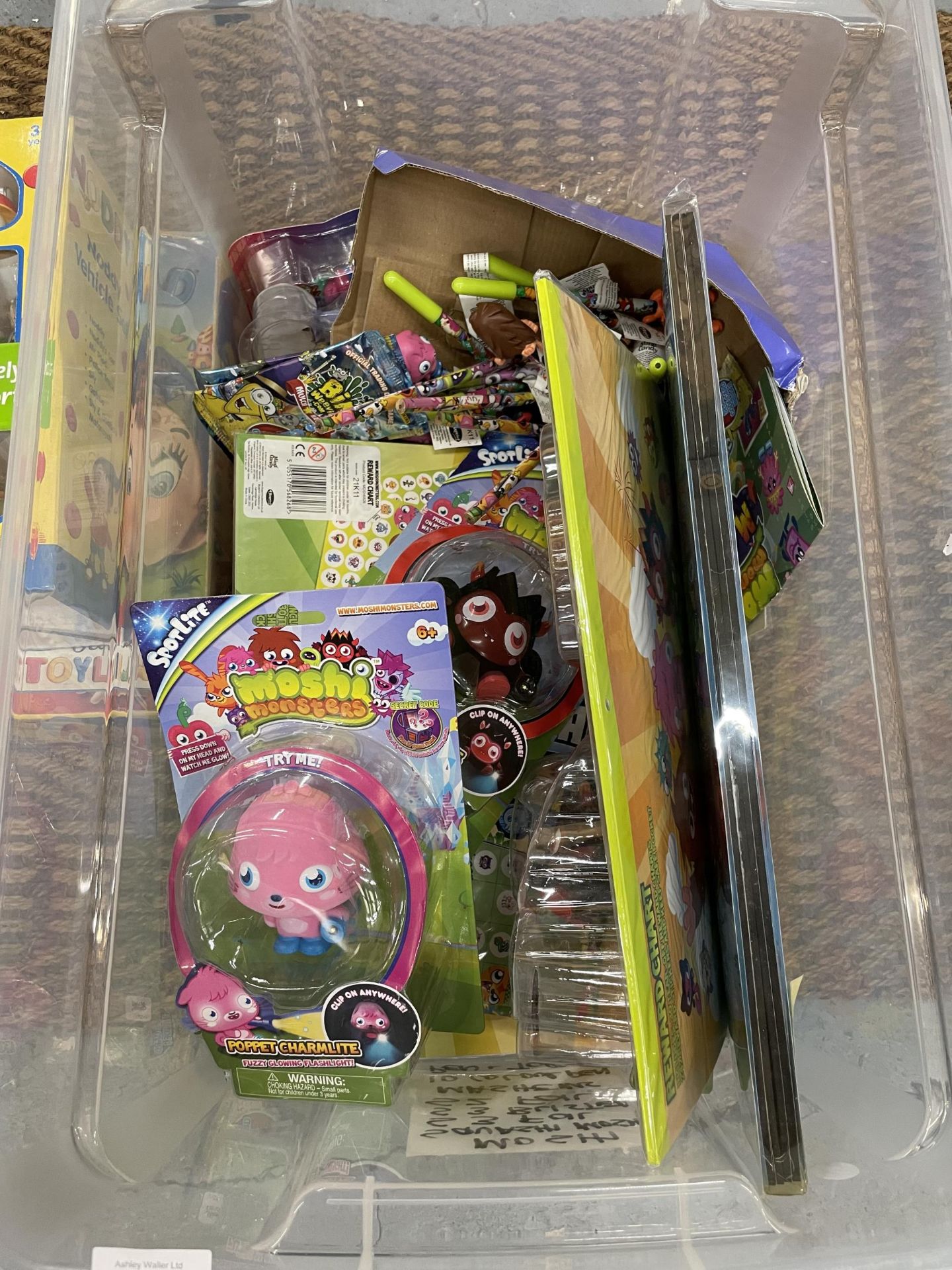A LARGE QUANTITY OF NEW ITEMS TO INCLUDE MOSHI MONSTERS REWARD CHARTS, FIGURES, TRADING CARS