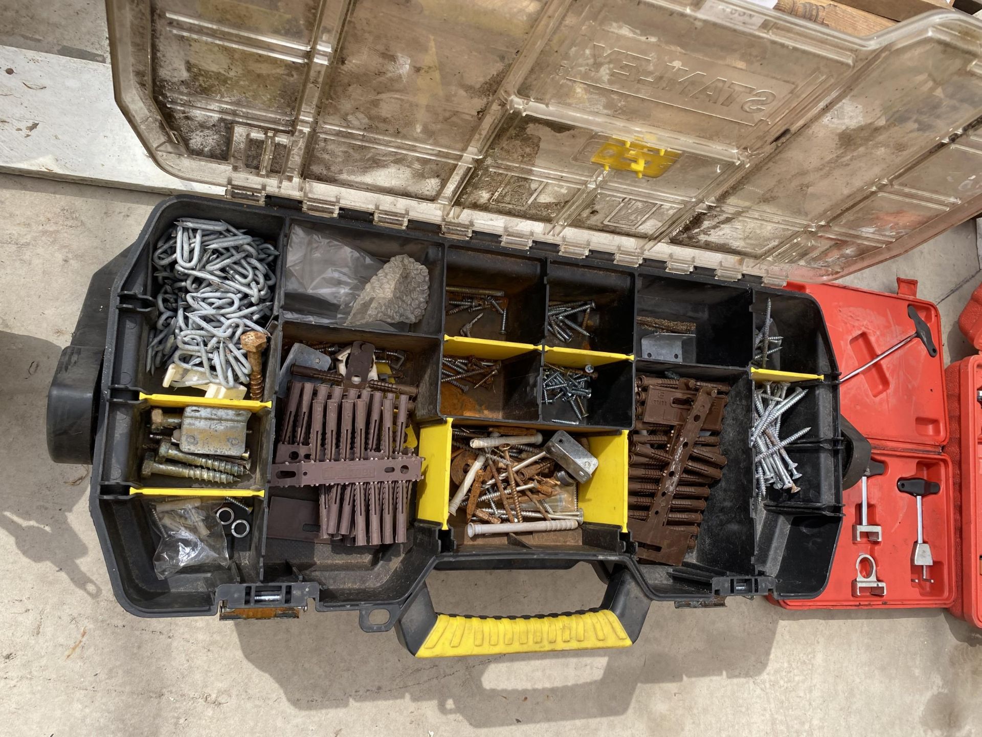 A PLASTIC STANLEY TOOL BOX CONTAINING AN ASSORTMENT OF HARDWARE TO INCLUDE SCREWS ETC - Image 2 of 3