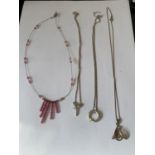 FOUR SILVER NECKLACES WITH PENDANTS