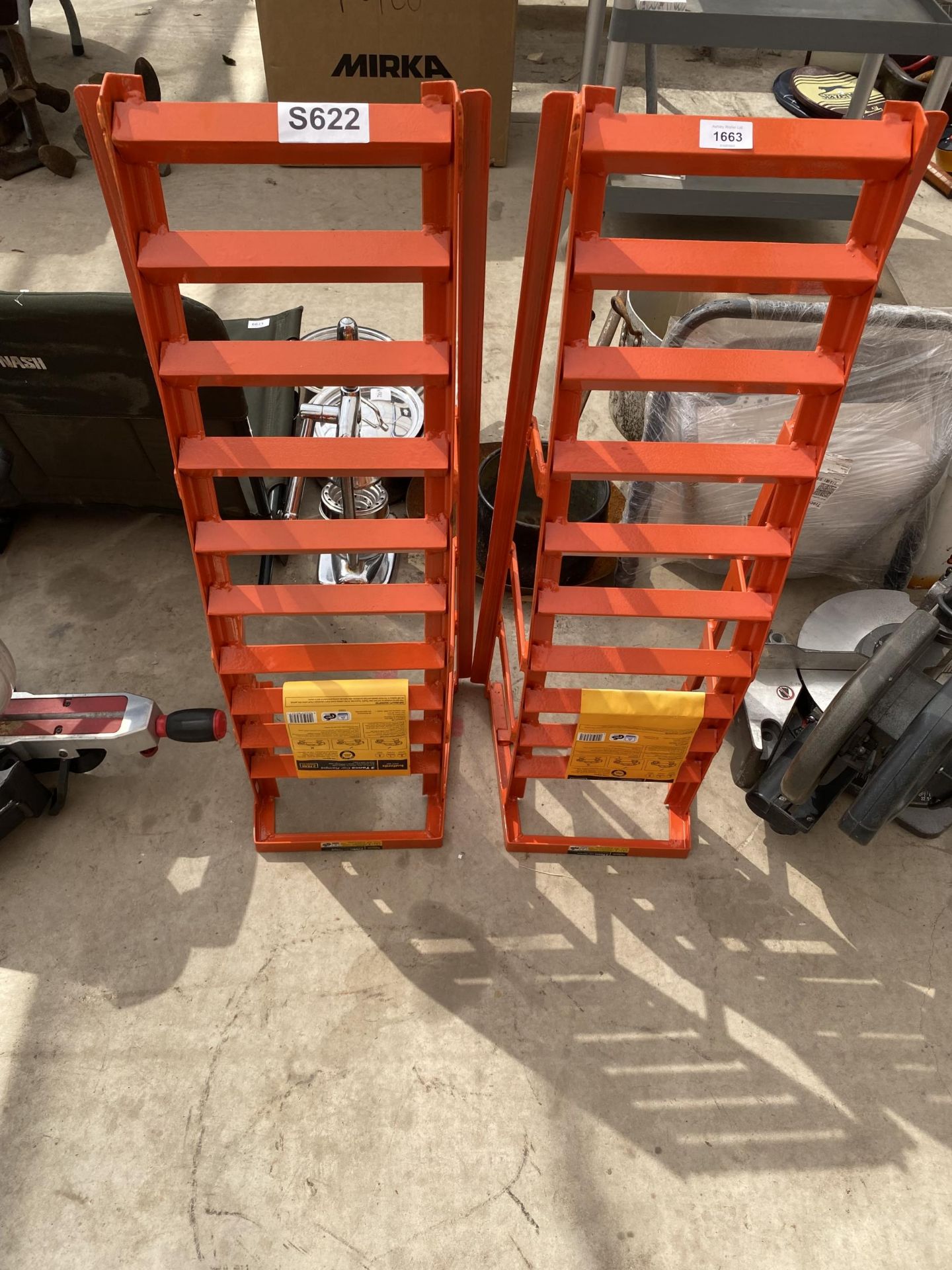 A PAIR OF AS NEW METAL CAR RAMPS