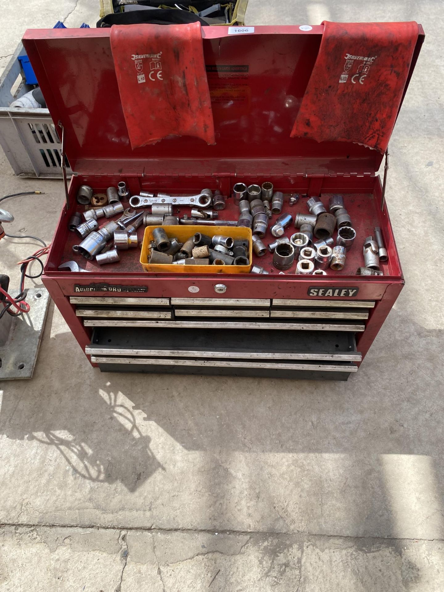 A METAL SEALEY WORKSHOP TOOL CHEST WITH AN ASSORTMENT OF SOCKETS