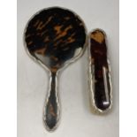 A HALLMARKED SILVER AND TORTOISESHELL EFFECT HAND MIRROR AND BRUSH