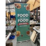A PULL OUT FOOD ADVERTISING STAND / SIGN