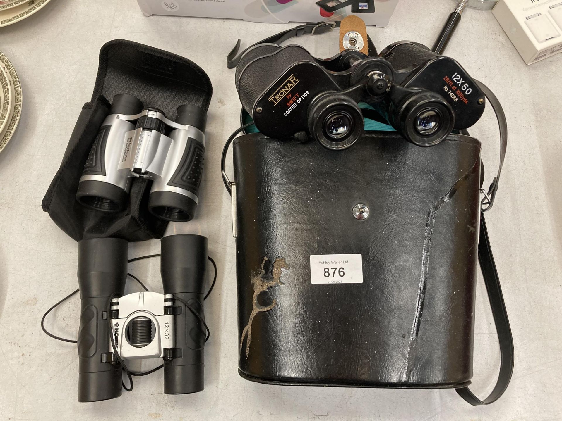 A PAIR OF TECNAR BY SWIFT BINOCULARS IN LEATHER CASE, PLUS TWO SMALLER PAIRS