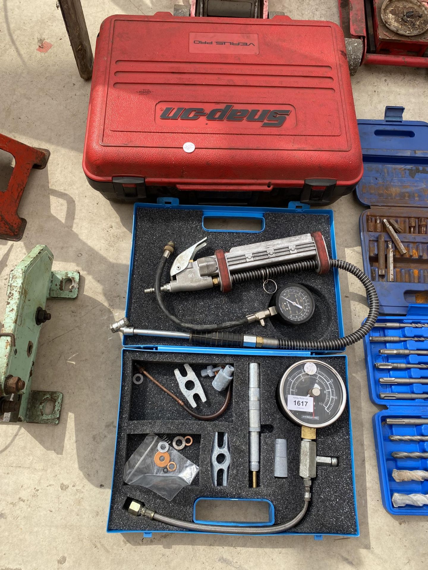 A COMPRESSOR GUAGE SET AND A SNAP ON TOOL CASE