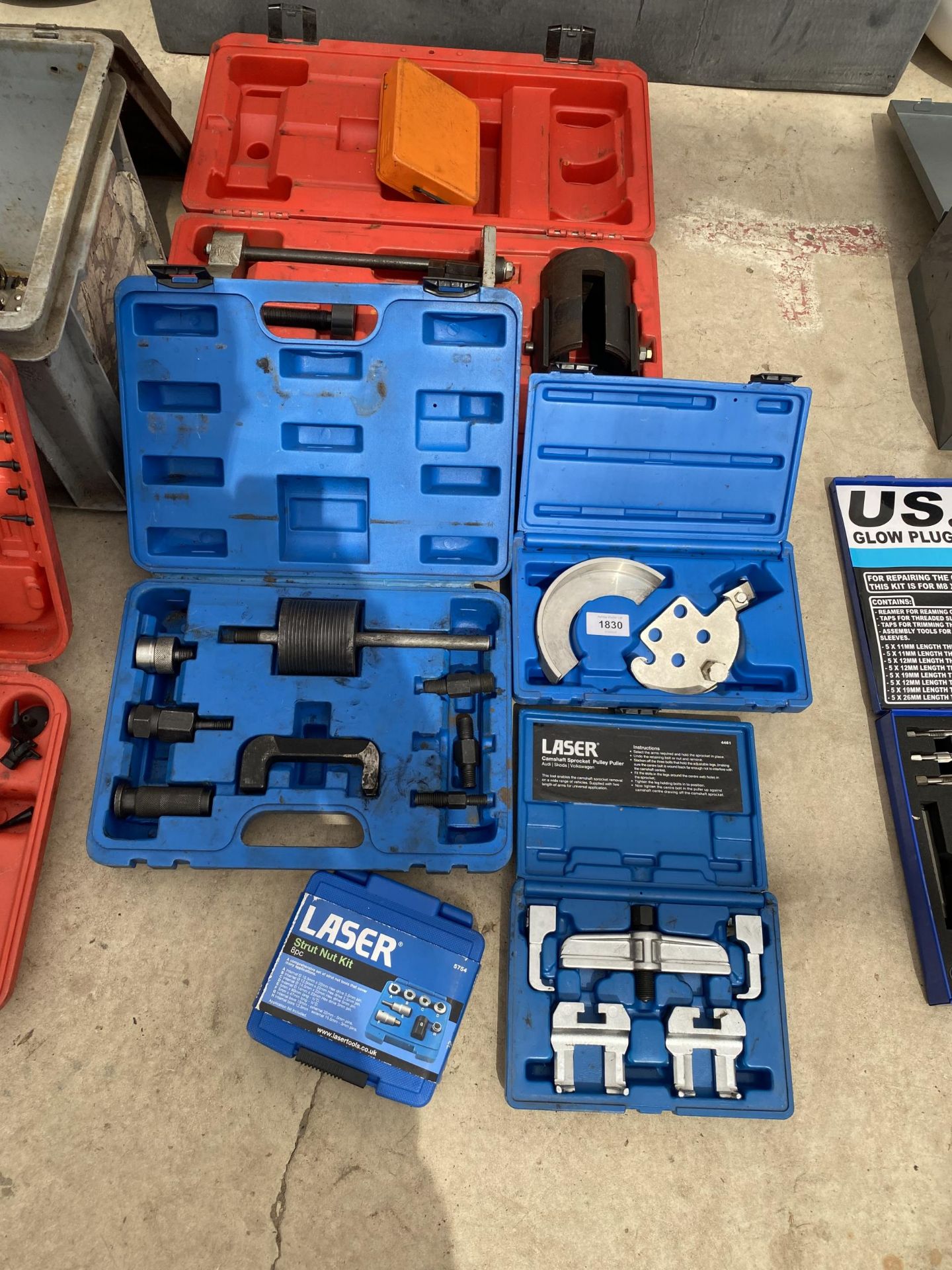 AN ASSORTMENT OF TOOLS TO INCLUDE A SPROKET PULLER KIT, A STRUT NUT KIT AND AN INJECTOR EXTRACTOR