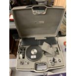 A VINTAGE PYE PORTABLE RECORD PLAYER IN A CASE