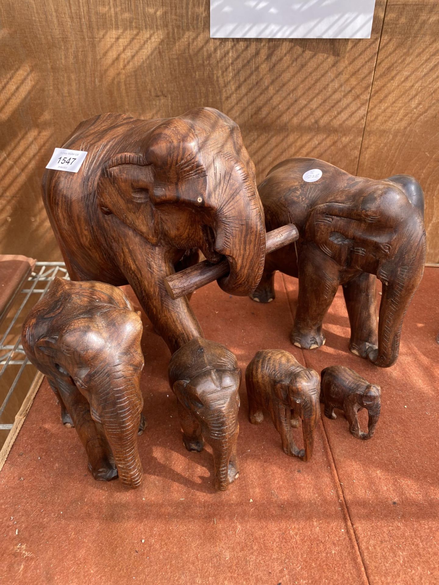 A COLLECTION OF SIX TREEN ELEPHANTS OF VARIOUS SIZES