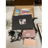 APINK NINTENDO DS LITE WITH CHARGER AND CASE, PHOTO ALBUM AND STATIONERY ITEMS