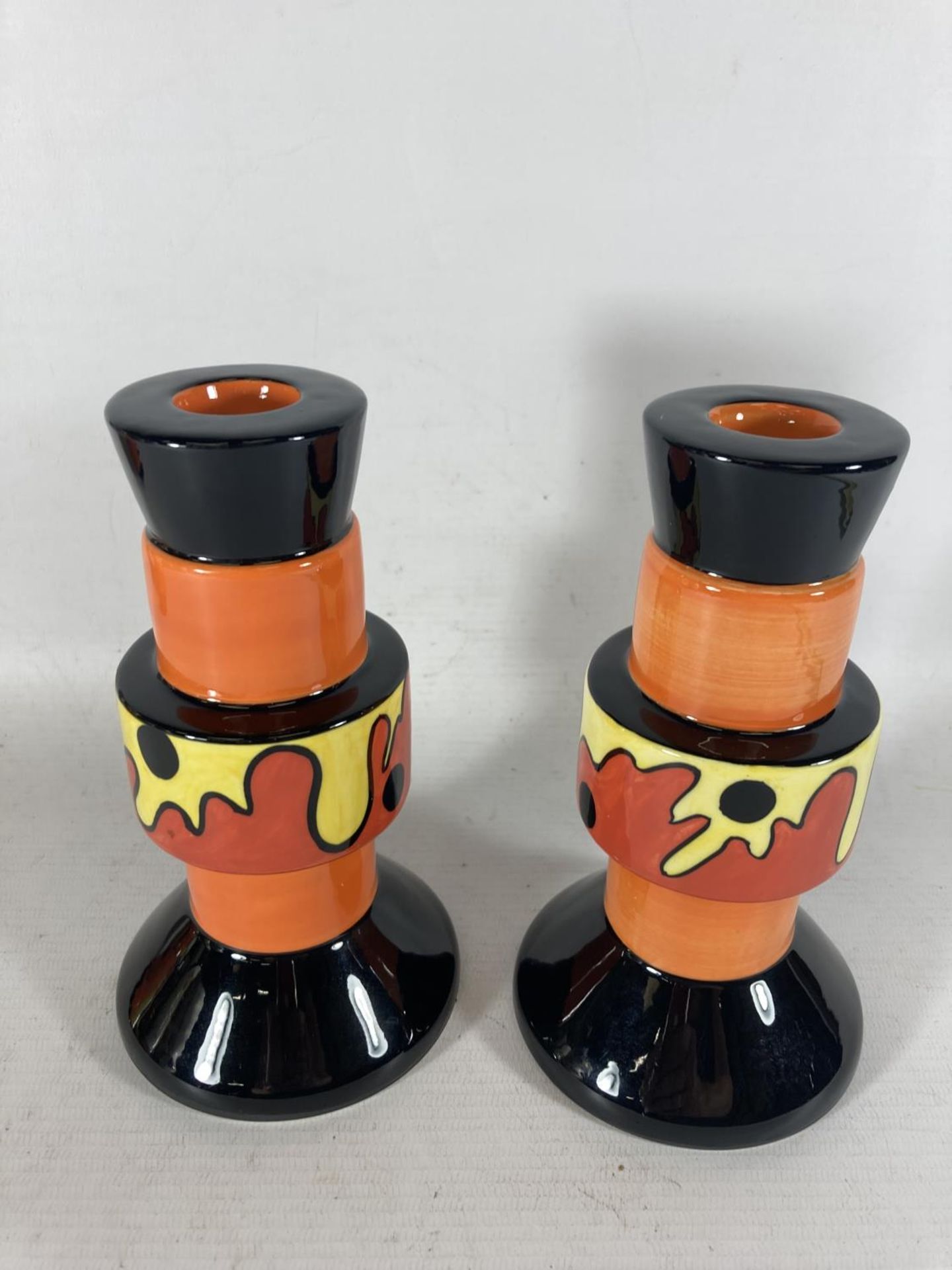 A PAIR OF HANDPAINTED AND SIGNED LORNA BAILEY CANDLESTICKS LAVA PATTERN - Image 2 of 3