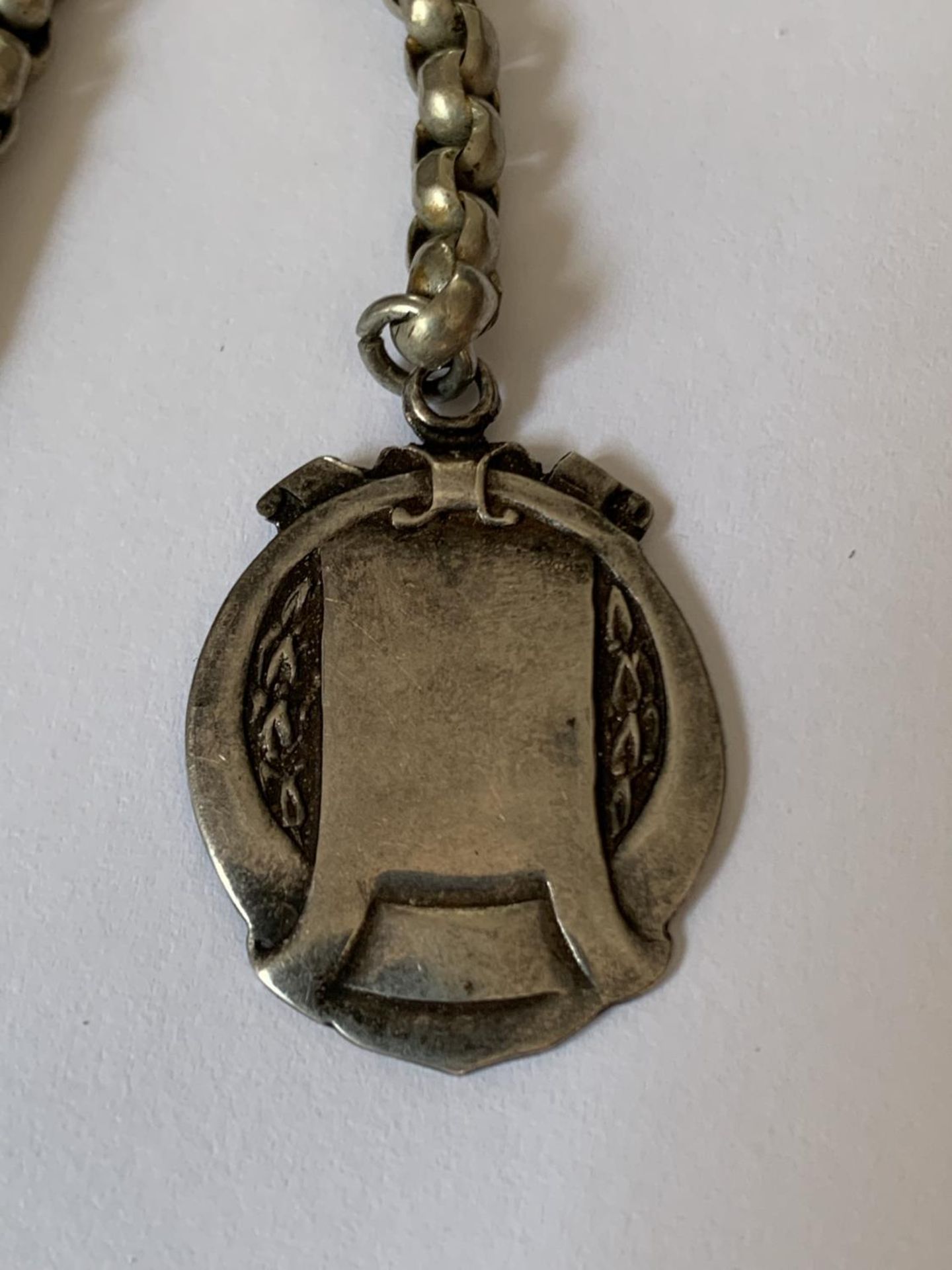 AN ORNATE HALF ALBERT WATCH CHAIN WITH FOB - Image 2 of 4