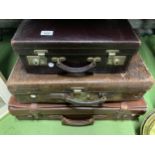 THREE VINTAGE LEATHER SUITCASES