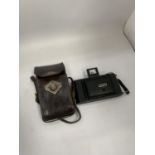 A VINTAGE KODAK CAMERA AND LEATHER CASE