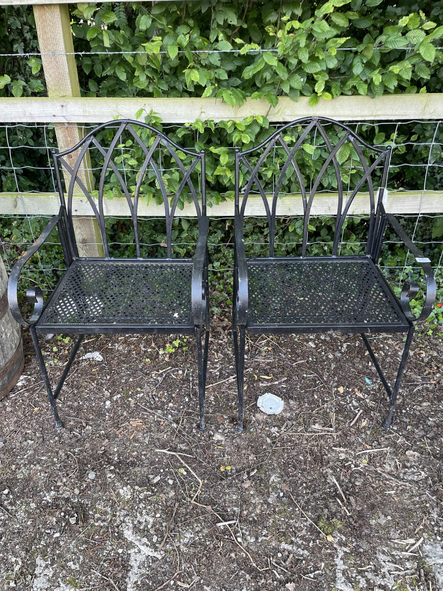 TWO FOLDING DECORATIVE METAL GARDEN CHAIRS