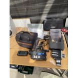 AN ASSORTMENT OF ELECTRICAL EQUIPMENT TO INCLUDE A PANASONIC CAMCORDER AND A BOSE DOCKING STATION