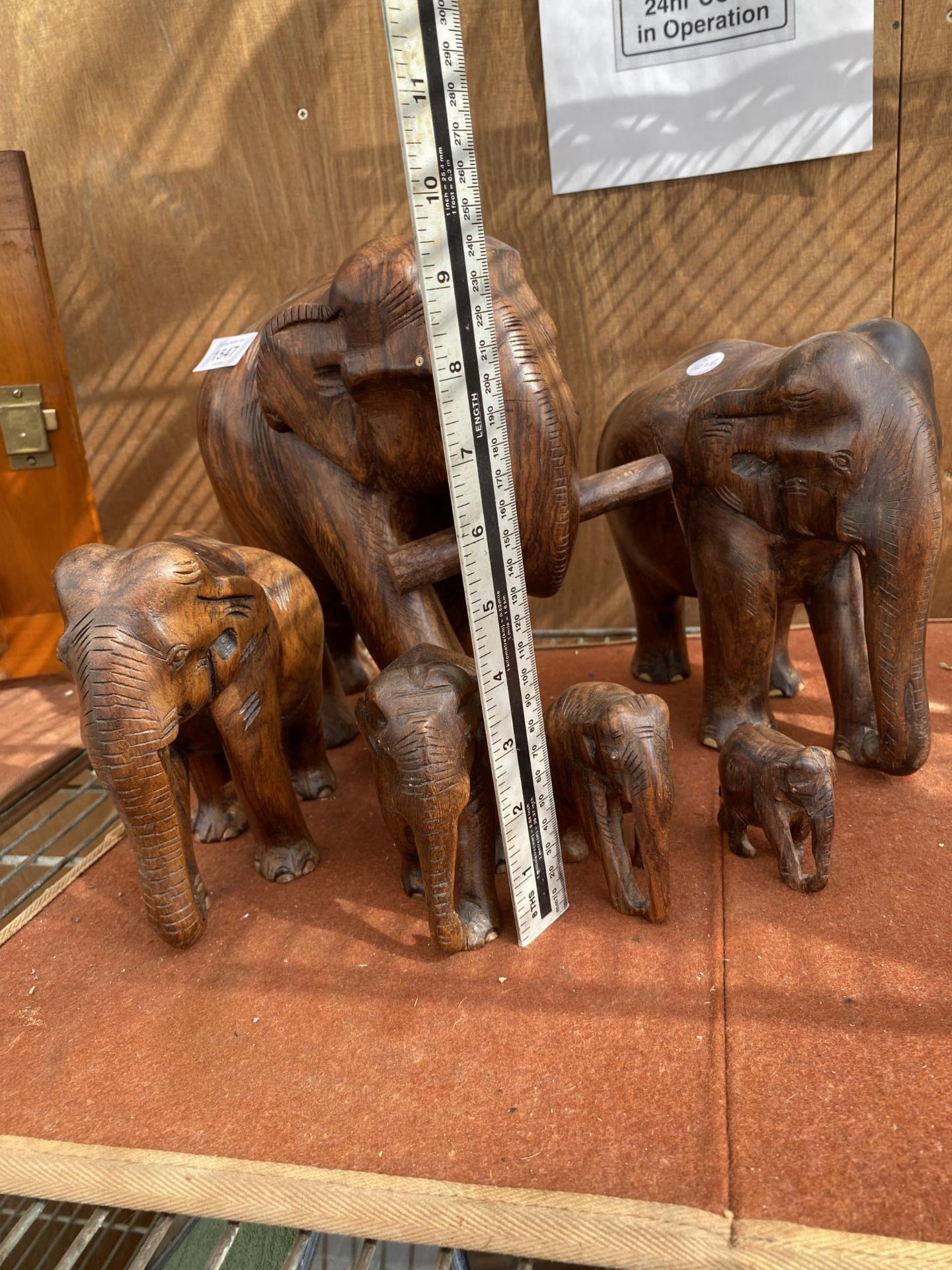 A COLLECTION OF SIX TREEN ELEPHANTS OF VARIOUS SIZES - Image 3 of 3