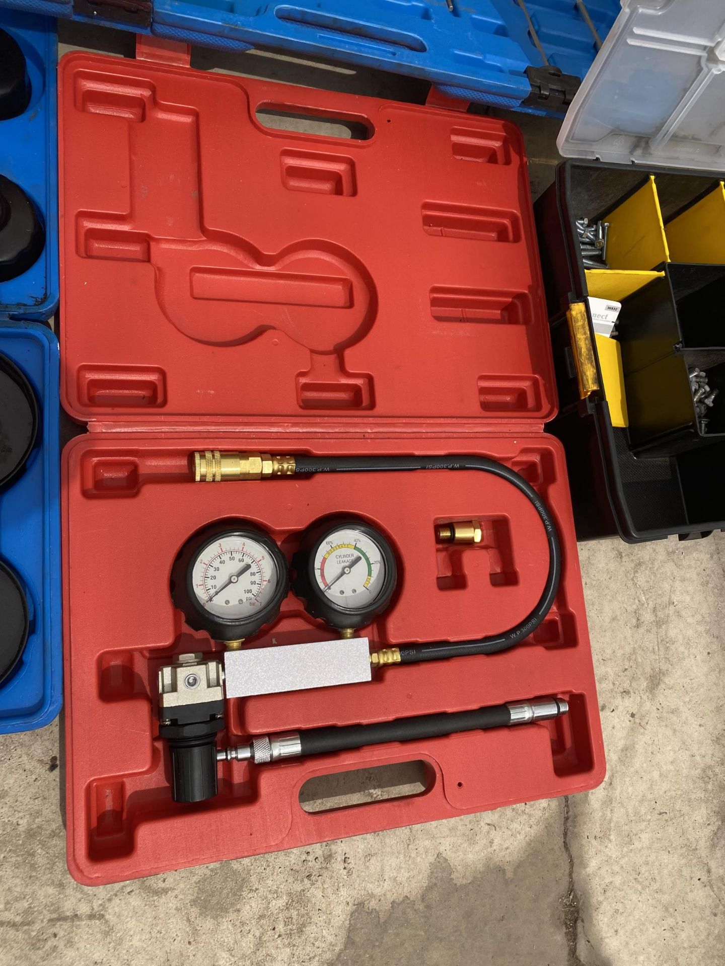 AN ASSORTMENT OF HARDWARE AND A PRESSURE GAUGE KIT AND OIL FILTER WRENCH KIT - Image 2 of 3