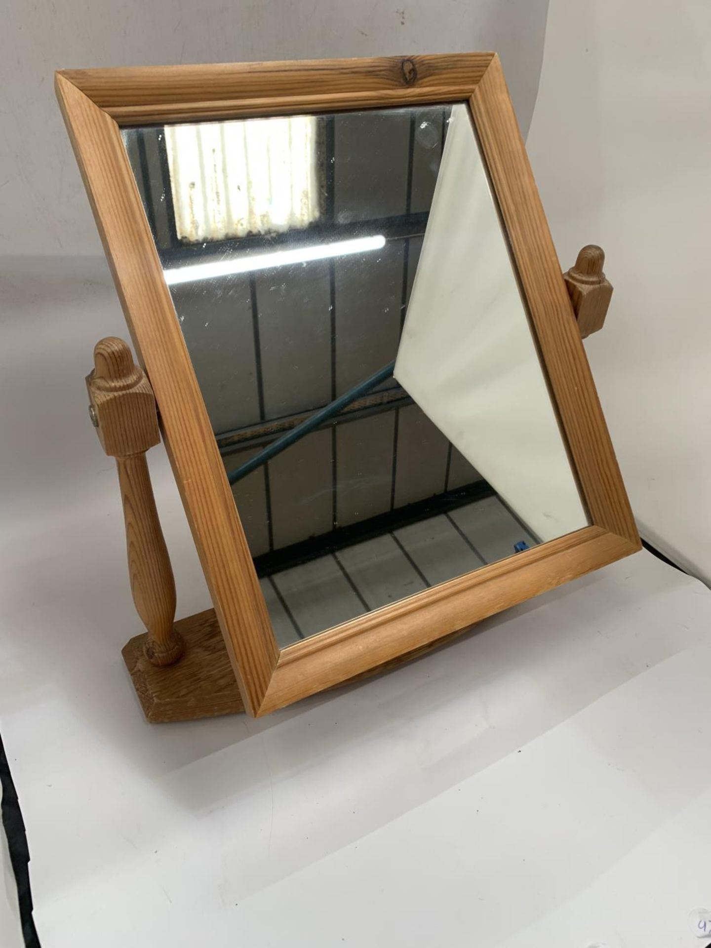 A PINE FRAMED DRESSING TABLE MIRROR