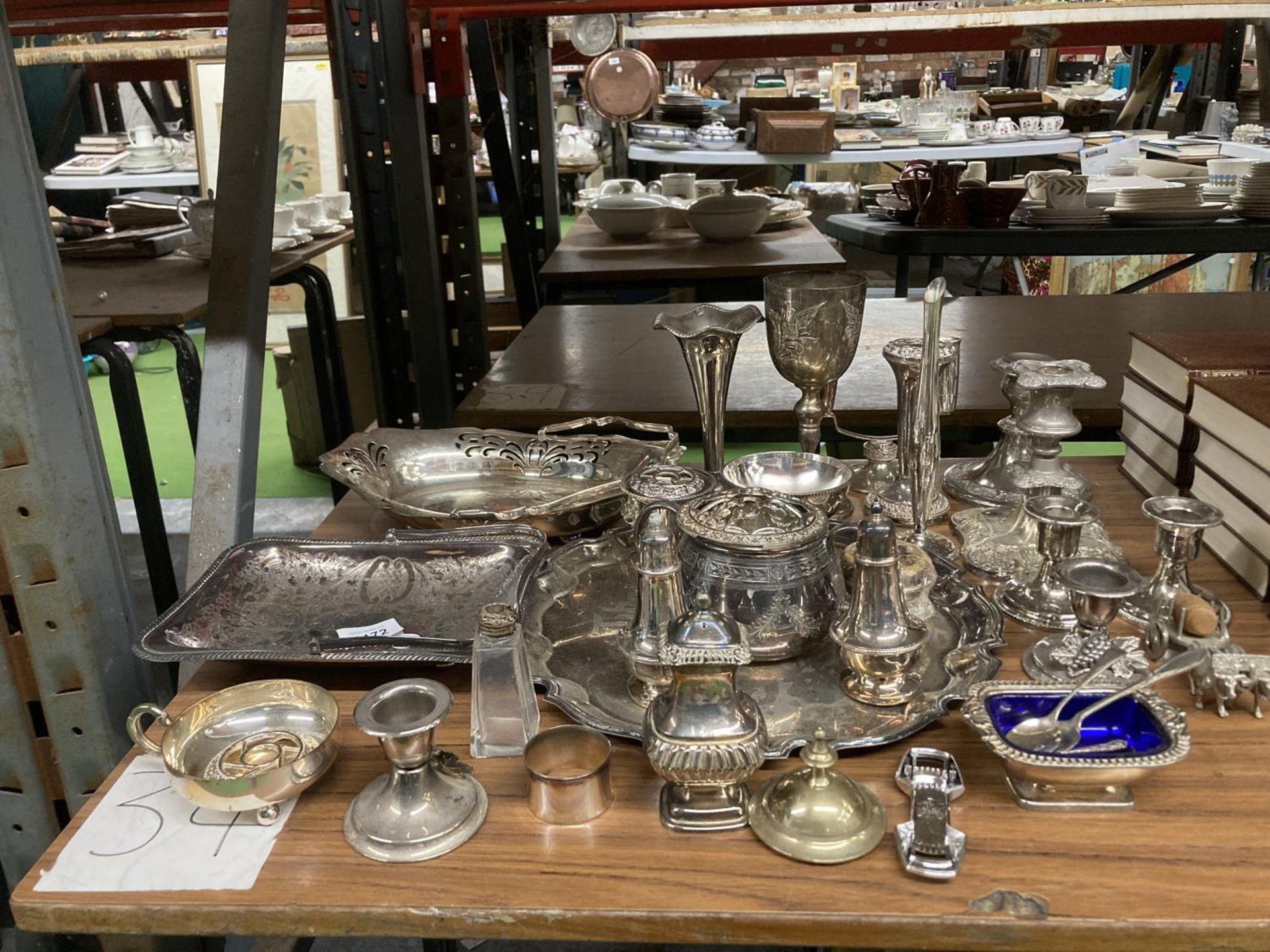 A LARGE MIXED LOT OF VINTAGE SILVER PLATED ITEMS, SALVER, LARGE GOBLET, CONDIMENT ITEMS ETC