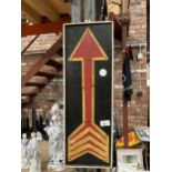 A HANDPAINTED WOODEN ARROW SIGN