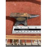 A MINIATURE CAST IRON SAMPLE ANVIL BEARING THE NAME LOSEPH WEBB & SONS BURY LANCASHIRE